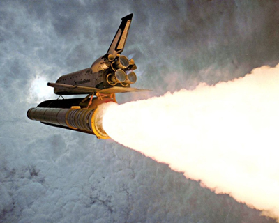 Space Shuttle and the Ideal rocket equation